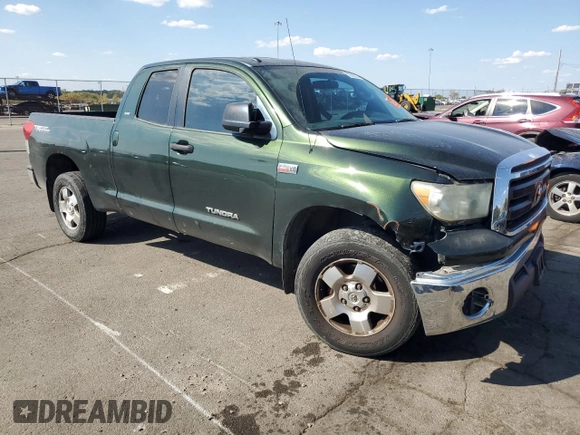 2011 Toyota Tundra 4WD Truck with VIN 5TFUY5F18BX195945, listed as a Copart auction lot 72439794 with 166,453 mi miles and Salvage Title. Bid and sale history available at carsss.com. Image 4.