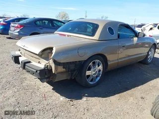 2005 Ford Thunderbird Deluxe with VIN 1FAHP60A45Y100899, listed as a IAAI auction lot 41803706 with 75,319 mi miles. Bid and sale history available at carsss.com. Image 4.