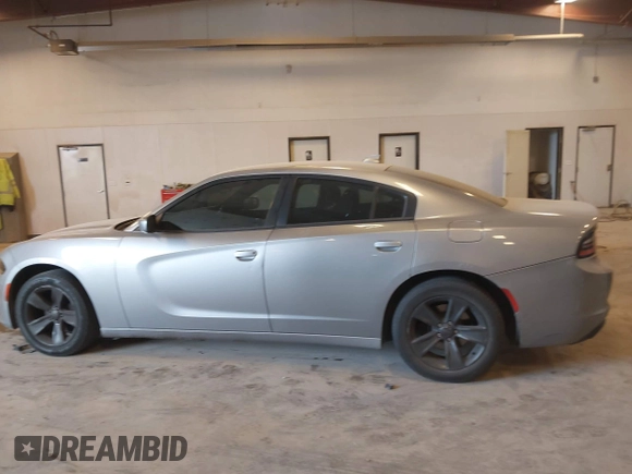 2015 Dodge Charger SXT with VIN 2C3CDXHG0FH851638, listed as a IAAI auction lot 42144753 with 188,929 mi miles and . Bid and sale history available at DreamBid. Image 13.