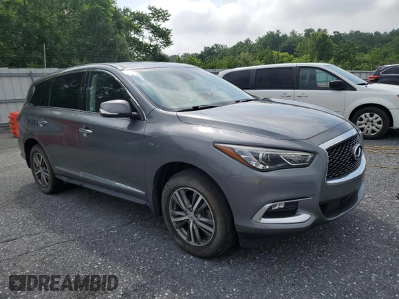 2020 Infiniti QX60 Luxe with VIN 5N1DL0MM4LC512641, listed as a Copart auction lot 63790245 with 101,694 mi miles and Salvage title. Bid and sale history available at DreamBid. Image 4.