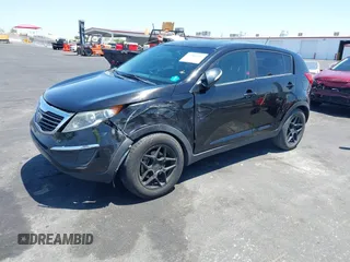 2013 Kia Sportage LX with VIN KNDPBCA25D7449584, listed as a IAAI auction lot 42489414 with 100,993 mi miles and . Bid and sale history available at DreamBid. Image 17.