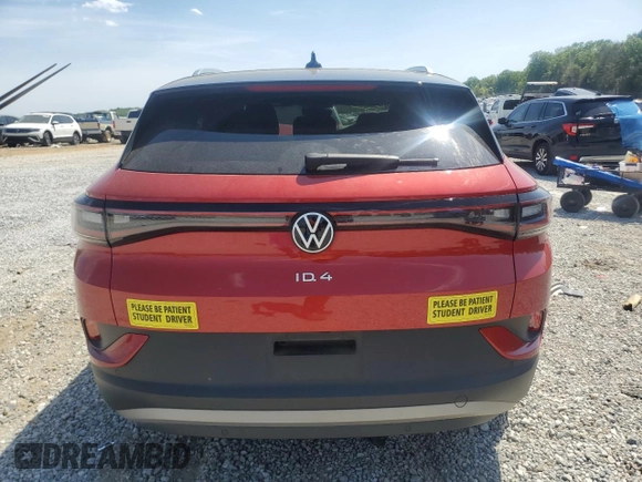 2021 Volkswagen ID.4 Pro S z VIN WVGKMPE29MP059900, wystawiony jako Copart lot #53725825 z przebiegiem Nie podano mil oraz Szkody całkowita. Historia ofert i sprzedaży dostępna na DreamBid. Obrazek 6.