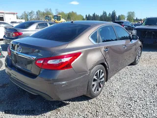 2017 Nissan Altima 2.5 SR with VIN 1N4AL3AP8HC180059, listed as a IAAI auction lot 42075133 with 197,955 mi miles. Bid and sale history available at carsss.com. Image 6.