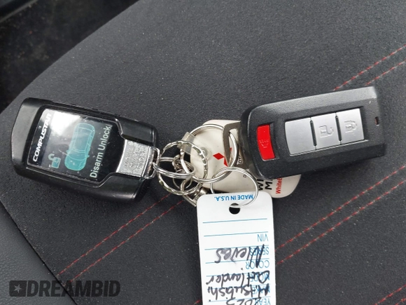 2023 Mitsubishi Outlander ES z VIN JA4ARUAUXPU001785, wystawiony jako IAAI lot #42014049 z przebiegiem 56 431 mil mil oraz . Historia ofert i sprzedaży dostępna na DreamBid. Obrazek 11.