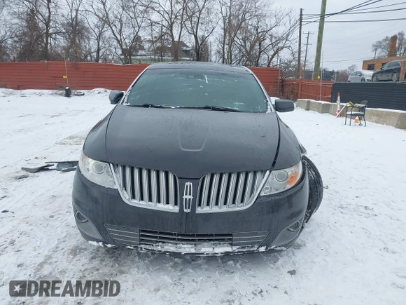 2012 Lincoln MKS with VIN 1LNHL9ER8CG806939, listed as a IAAI auction lot 41417607 with 147,808 mi miles. Bid and sale history available at carsss.com. Image 12.