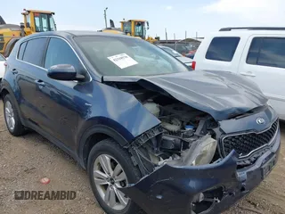 2018 Kia Sportage LX z VIN KNDPMCAC7J7341868, wystawiony jako IAAI lot #42318570 z przebiegiem 107 245 mil mil oraz . Historia ofert i sprzedaży dostępna na DreamBid. Obrazek 1.