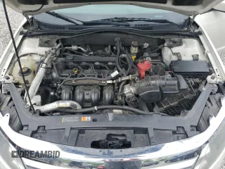 2010 Ford Fusion SE z VIN 3FAHP0HA9AR306505, wystawiony jako Copart lot #55057295 z przebiegiem 214 141 mil mil oraz Nie do naprawy • Non repairable. Historia ofert i sprzedaży dostępna na DreamBid. Obrazek 11.