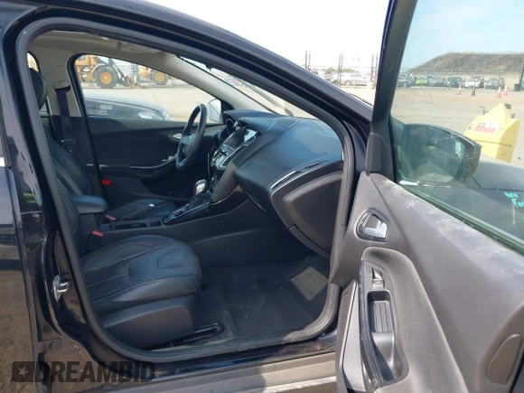 2017 Ford Focus Titanium with VIN 1FADP3N29HL319759, listed as a IAAI auction lot 42458289 with 213,674 mi miles and . Bid and sale history available at DreamBid. Image 5.