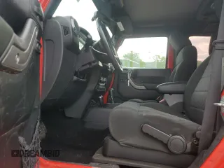 2015 Jeep Wrangler Sport with VIN 1C4AJWAG6FL715453, listed as a Copart auction lot 53686145 with 88,504 mi miles and Salvage Title. Bid and sale history available at DreamBid. Image 7.