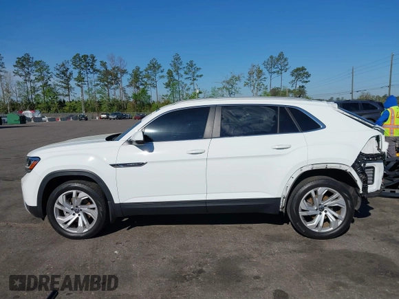 2021 Volkswagen Atlas SEL z VIN 1V2EE2CA2MC227667, wystawiony jako IAAI lot #41886405 z przebiegiem 41 928 mil mil oraz . Historia ofert i sprzedaży dostępna na DreamBid. Obrazek 15.