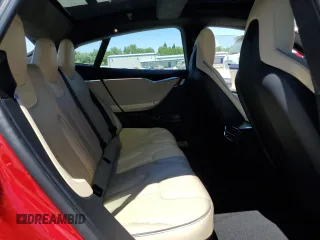 2014 Tesla Model S 60 with VIN 5YJSA1H17EFP64266, listed as a Copart auction lot 61678485 with 104,160 mi miles and Salvage title. Bid and sale history available at DreamBid. Image 10.