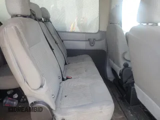 2015 Ford Transit Passenger XL z VIN 1FBAX2CM5FKB22509, wystawiony jako Copart lot #50359265 z przebiegiem 190 581 mil mil oraz Szkody całkowita. Historia ofert i sprzedaży dostępna na DreamBid. Obrazek 11.