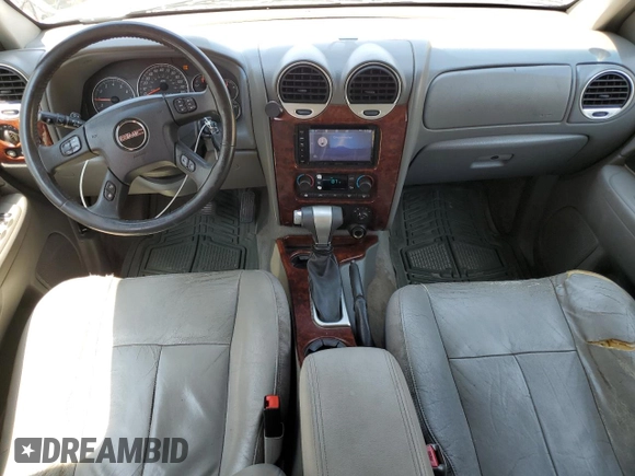 2006 GMC Envoy SLE z VIN 1GKDT13S762345183, wystawiony jako Copart lot #60096645 z przebiegiem 249 658 mil mil oraz Szkoda całkowita • Salvage title. Historia ofert i sprzedaży dostępna na DreamBid. Obrazek 8.