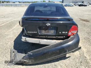 2000 Nissan Maxima GXE z VIN JN1CA31D6YT762114, wystawiony jako Copart lot #57908775 z przebiegiem 207 805 mil mil oraz Szkody całkowita. Historia ofert i sprzedaży dostępna na DreamBid. Obrazek 6.