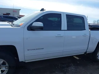 2017 Chevrolet Silverado 1500 LT with VIN 3GCUKREC5HG414935, listed as a IAAI auction lot 41064938 with 197,767 mi miles and . Bid and sale history available at DreamBid. Image 15.