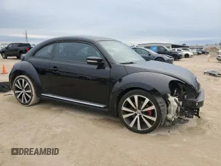 2012 Volkswagen Beetle 2.0T Turbo w/Sun/Sound with VIN 3VWV67ATXCM645050, listed as a Copart auction lot 45746555 with 152,935 mi miles and Salvage Title. Bid and sale history available at carsss.com. Image 4.