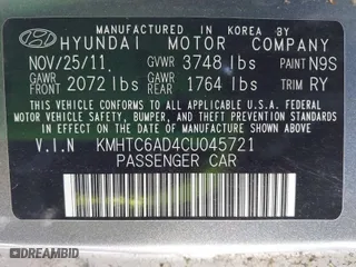 2012 Hyundai Veloster w/Gray Int with VIN KMHTC6AD4CU045721, listed as a IAAI auction lot 41836004 with 133,510 mi miles. Bid and sale history available at carsss.com. Image 9.