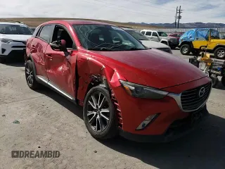 2017 Mazda CX-3 Grand Touring z VIN JM1DKFD74H0167026, wystawiony jako Copart lot #48817725 z przebiegiem 84 053 mil mil oraz Szkody całkowita. Historia ofert i sprzedaży dostępna na DreamBid. Obrazek 12.