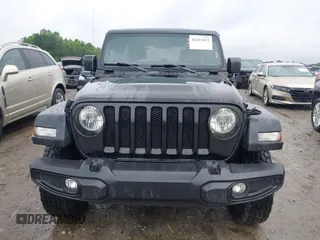 2021 Jeep Wrangler Unlimited Sport S with VIN 1C4HJXDN0MW678801, listed as a IAAI auction lot 42211815 with 96,849 mi miles and . Bid and sale history available at DreamBid. Image 12.