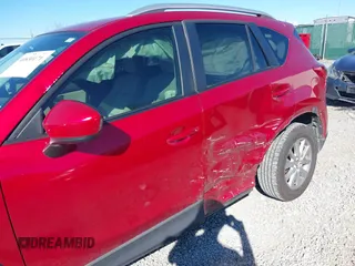 2014 Mazda CX-5 Touring с VIN JM3KE2CY7E0341630, выставлен на аукционе IAAI как лот 40830171 с пробегом 117 430 миль миль и . История ставок и продаж доступна на DreamBid. Изображение 6.