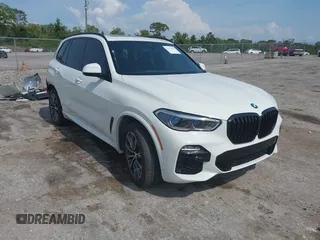 2021 BMW X5 xDrive45e z VIN 5UXTA6C08M9F38909, wystawiony jako IAAI lot #42172536 z przebiegiem 71 741 mil mil oraz . Historia ofert i sprzedaży dostępna na DreamBid. Obrazek 1.