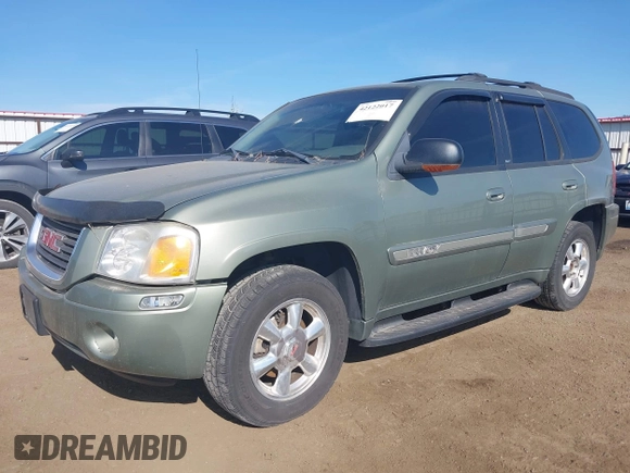 2003 GMC Envoy SLT with VIN 1GKDT13S932373739, listed as a IAAI auction lot 42122017 with 155,963 mi miles. Bid and sale history available at carsss.com. Image 2.