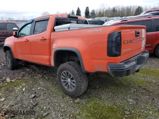 2021 Chevrolet Colorado 4WD ZR2 with VIN 1GCGTEEN5M1142481, listed as a Copart auction lot 84079064 with 80,884 mi miles and Salvage Title. Bid and sale history available at carsss.com. Image 2.