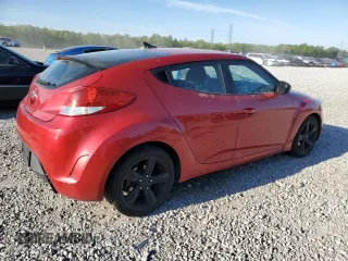2014 Hyundai Veloster z VIN KMHTC6AD8EU213234, wystawiony jako Copart lot #53297535 z przebiegiem 131 769 mil mil oraz Szkoda całkowita • Salvage title. Historia ofert i sprzedaży dostępna na DreamBid. Obrazek 3.