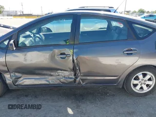 2007 Toyota Prius z VIN JTDKB20UX73217307, wystawiony jako IAAI lot #42225740 z przebiegiem 196 251 mil mil oraz . Historia ofert i sprzedaży dostępna na DreamBid. Obrazek 14.