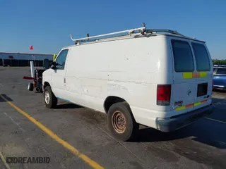 2013 Ford Econoline Cargo Van Commercial with VIN 1FTNE2EW1DDA18621, listed as a IAAI auction lot 42074413 with 204,073 mi miles. Bid and sale history available at carsss.com. Image 3.