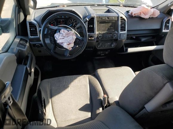 2015 Ford F-150 XL with VIN 1FTEW1CG6FKD17068, listed as a Copart auction lot 56989975 with 170,606 mi miles and Salvage title. Bid and sale history available at DreamBid. Image 8.