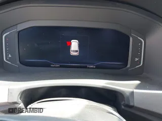 2019 Volkswagen Atlas SEL z VIN 1V2ER2CA5KC555568, wystawiony jako IAAI lot #42050516 z przebiegiem 71 599 mil mil oraz . Historia ofert i sprzedaży dostępna na DreamBid. Obrazek 7.