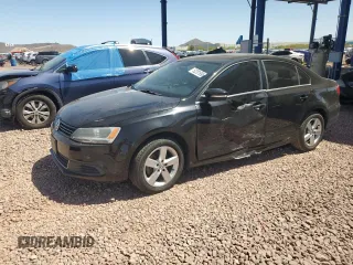 2014 Volkswagen Jetta TDI w/Premium with VIN 3VWLL7AJ8EM402757, listed as a Copart auction lot 52201895 with 99,475 mi miles and Salvage title. Bid and sale history available at DreamBid. Image 1.