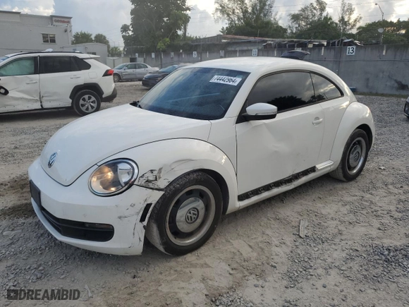 2012 Volkswagen Beetle 2.5L w/Sun PZEV with VIN 3VWJP7ATXCM631497, listed as a Copart auction lot 74442964 with 72,097 mi miles and Salvage Title. Bid and sale history available at carsss.com. Image 1.