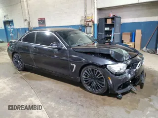 2015 BMW 4 Series 435i z VIN WBA3T3C52FP739087, wystawiony jako Copart lot #50950165 z przebiegiem 97 401 mil mil oraz Czysty tytuł • Clean title. Historia ofert i sprzedaży dostępna na DreamBid. Obrazek 4.