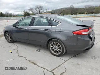 2017 Ford Fusion SE with VIN 3FA6P0HDXHR388319, listed as a Copart auction lot 51466285 with 176,811 mi miles and Salvage Title. Bid and sale history available at DreamBid. Image 2.