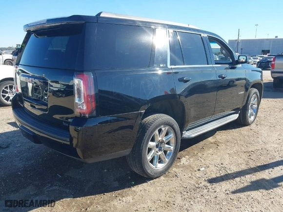 2017 GMC Yukon SLT with VIN 1GKS1BKCXHR150511, listed as a IAAI auction lot 40889035 with 68090 miles. Bid and sale history available at carsss.com. Image 4.