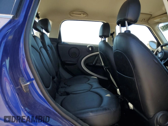 2015 MINI Countryman with VIN WMWZB3C53FWR44727, listed as a Copart auction lot 49456945 with 89,381 mi miles and Salvage Title. Bid and sale history available at DreamBid. Image 12.