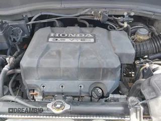 2007 Honda Ridgeline RTL with VIN 2HJYK16577H537990, listed as a IAAI auction lot 42454619 with 182,911 mi miles and . Bid and sale history available at DreamBid. Image 10.