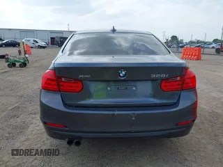 2014 BMW 3 Series 328i xDrive with VIN WBA3B3C55EJ977584, listed as a IAAI auction lot 42805585 with 135,855 mi miles and . Bid and sale history available at DreamBid. Image 16.