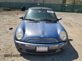 2006 MINI Convertible with VIN WMWRF33556TG14421, listed as a Copart auction lot 50090415 with 136,736 mi miles and Non repairable. Bid and sale history available at DreamBid. Image 5.