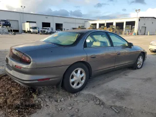 1999 Oldsmobile Aurora with VIN 1G3GR62C8X4116452, listed as a Copart auction lot 84070784 with 92,526 mi miles and Non Repairable. Bid and sale history available at DreamBid. Image 3.