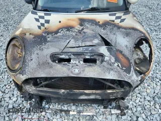 2015 MINI Hardtop 4 Door S z VIN WMWXU3C50F2B56953, wystawiony jako Copart lot #58579615 z przebiegiem Nie podano mil oraz Szkoda całkowita • Salvage title. Historia ofert i sprzedaży dostępna na DreamBid. Obrazek 11.