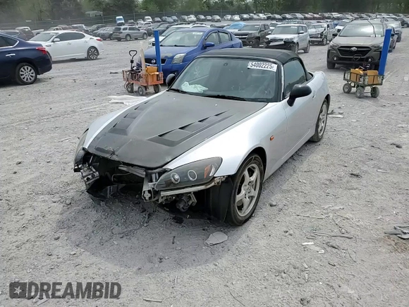 2002 Honda S2000 z VIN JHMAP11472T005753, wystawiony jako Copart lot #54002225 z przebiegiem 156 893 mil mil oraz Czysty tytuł • Clean title. Historia ofert i sprzedaży dostępna na DreamBid. Obrazek 14.