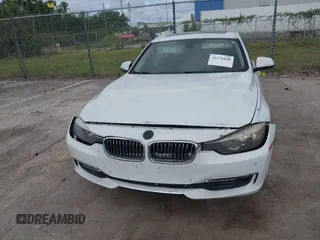 2012 BMW 3 Series 328i with VIN WBA3A5C57CF347953, listed as a IAAI auction lot 42176008 with 140,598 mi miles and . Bid and sale history available at carsss.com. Image 6.
