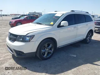 2016 Dodge Journey Crossroad Plus z VIN 3C4PDCGB1GT123363, wystawiony jako IAAI lot #41857436 z przebiegiem 134 769 mil mil oraz . Historia ofert i sprzedaży dostępna na DreamBid. Obrazek 2.