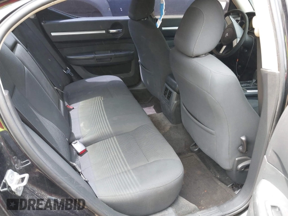2010 Dodge Charger SXT with VIN 2B3CA3CV9AH245848, listed as a IAAI auction lot 42212196 with 156,863 mi miles and . Bid and sale history available at DreamBid. Image 8.