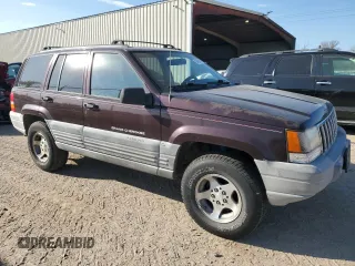 1998 Jeep Grand Cherokee Laredo with VIN 1J4FX58SXWC144715, listed as a Copart auction lot 86423594 with 93,936 mi miles and Clean Title. Bid and sale history available at carsss.com. Image 4.