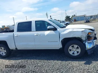 2016 Chevrolet Silverado 1500 LT with VIN 3GCUKREC1GG278916, listed as a IAAI auction lot 41799147 with 123,217 mi miles and . Bid and sale history available at DreamBid. Image 6.