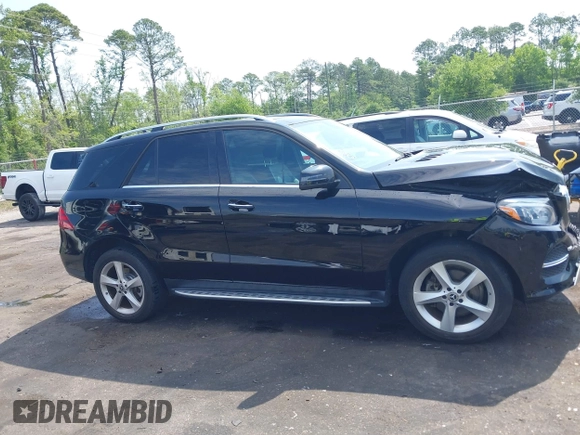 2018 Mercedes-Benz GLE 350 z VIN 4JGDA5HB1JB070660, wystawiony jako IAAI lot #42218013 z przebiegiem 66 626 mil mil oraz . Historia ofert i sprzedaży dostępna na DreamBid. Obrazek 13.